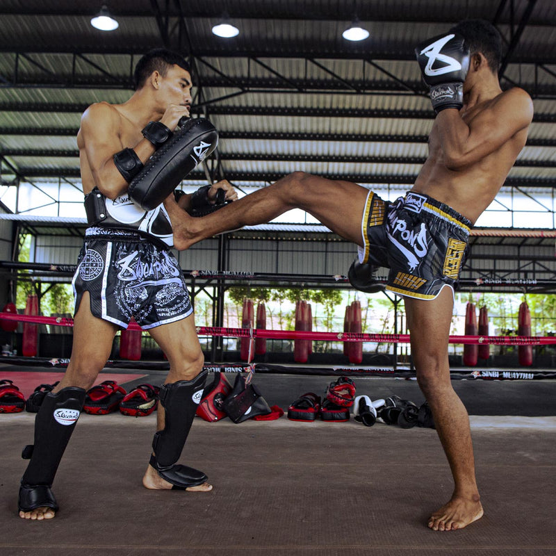 Protège-tibias boxe Thaï 8 Weapons Unlimited - Autres protections - Boxe  Thaï - Sports de combat